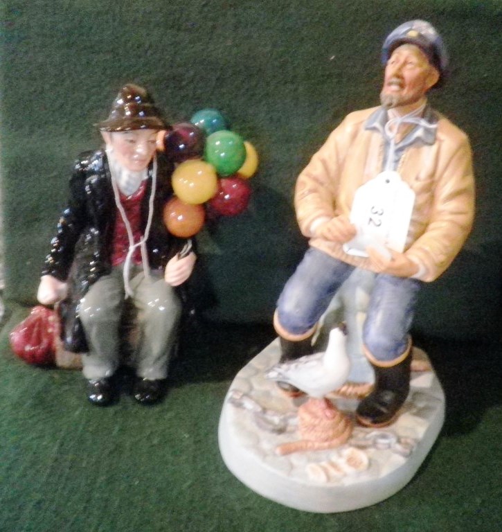 A Royal Doulton figure, The Seafarer, together with another, The Balloon Man.