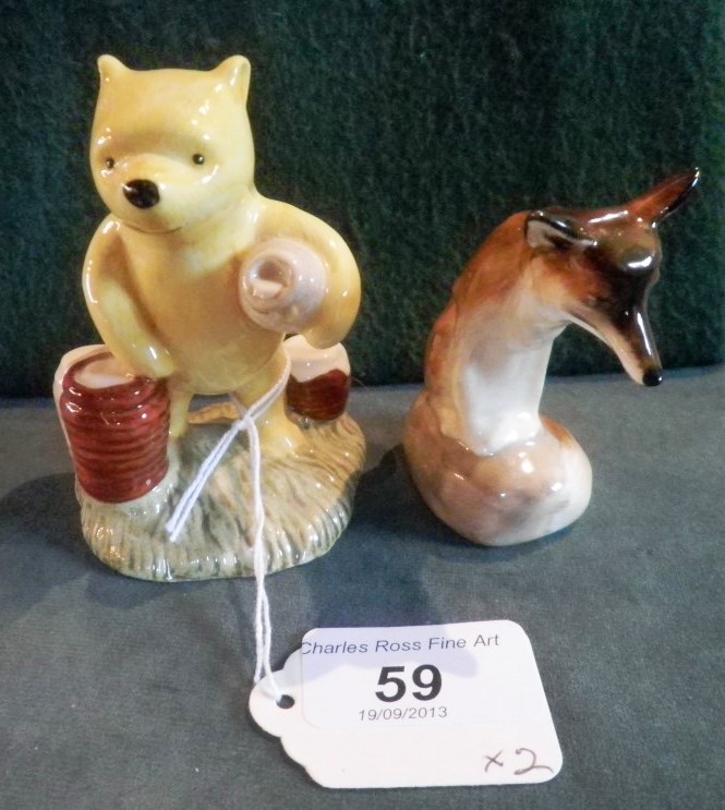 A Royal Doulton model of a seated fox, HN147, 7.5cm, together with a Royal Doulton figure of
