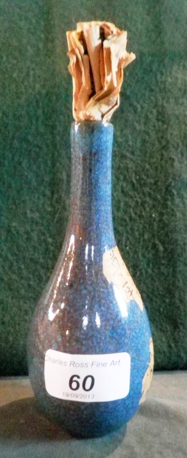 A late 19th/early 20th century Japanese sake bottle of traditional form, decorated with crackle