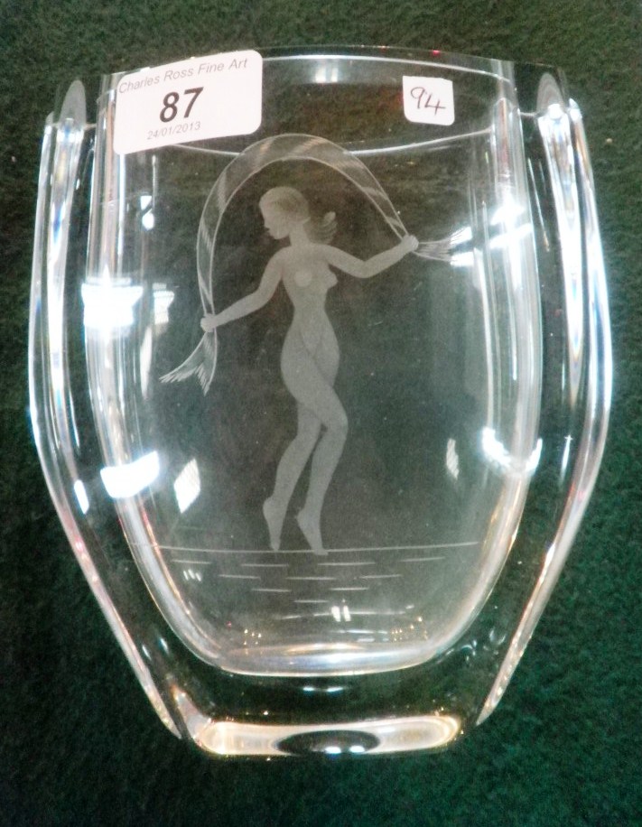 A probably Scandinavian hand blown cased clear glass vase, etched with a young woman dancing with