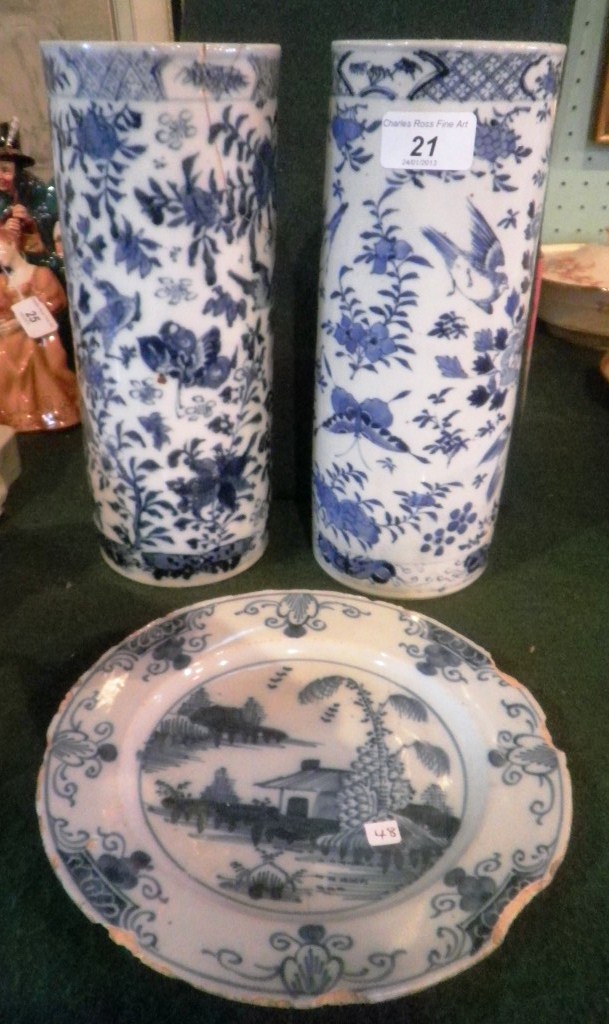 A pair of 19th century Chinese porcelain vases, each of cylindrical form, decorated with birds,