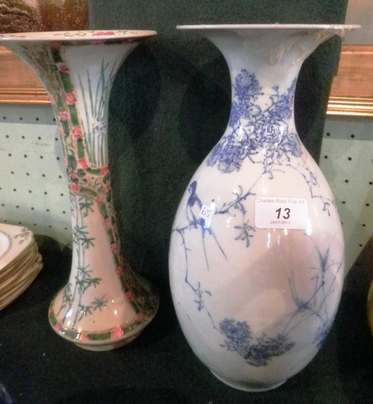 A early 20th century Oriental porcelain vase of baluster form, having flared rim and decorated