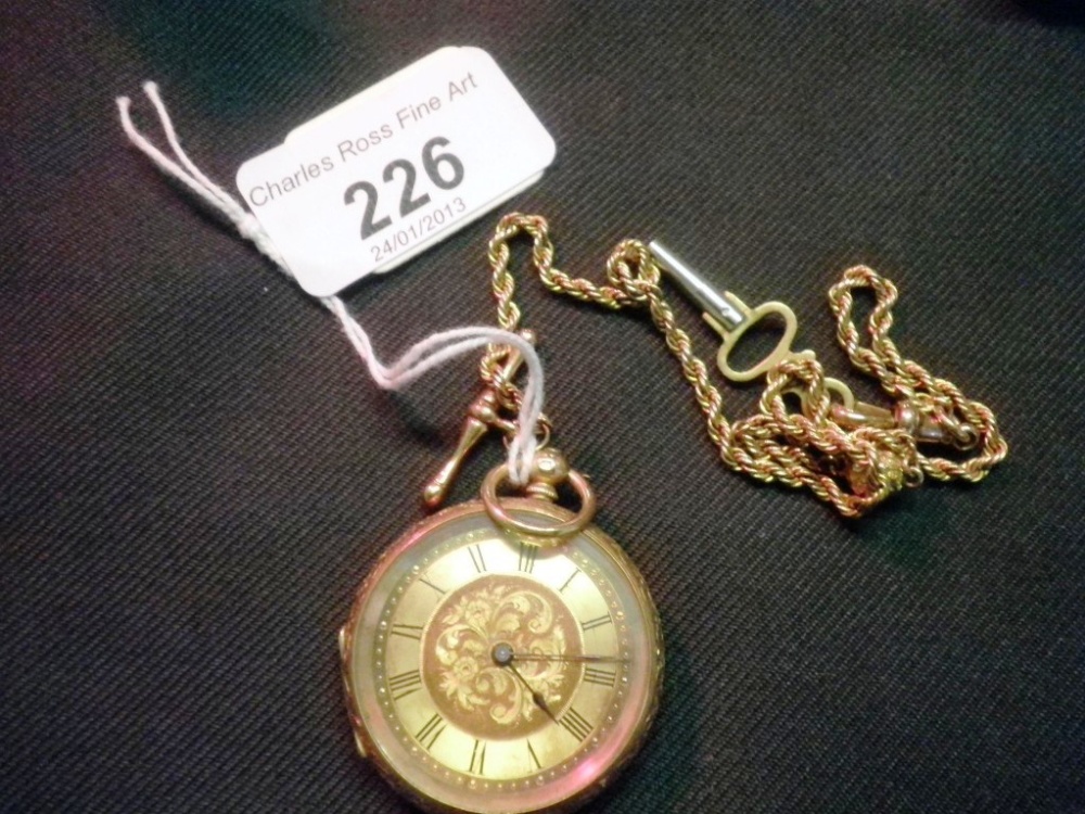 A lady`s continental 18 carat gold cased open faced fob watch, suspended from a 9 carat gold chain.