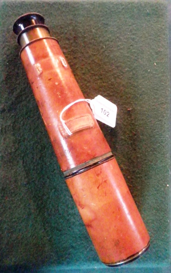 T T & H Limited.  A leather cased brass three draw WWI telescope.