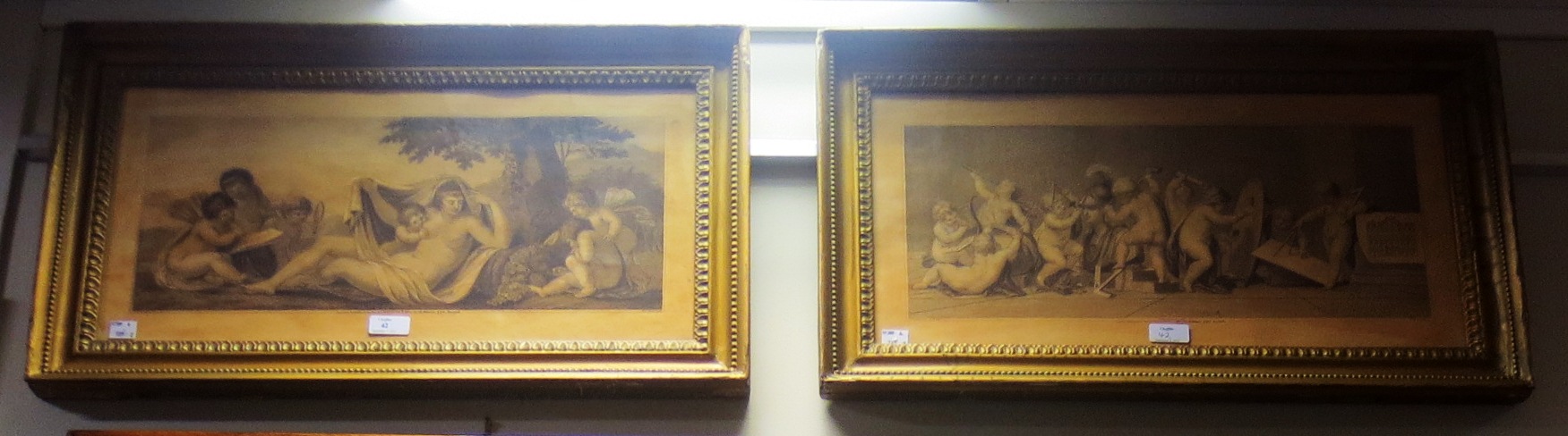 A pair of gilt framed engravings of cherbus after Bartolozzi A pair of gilt framed engravings of