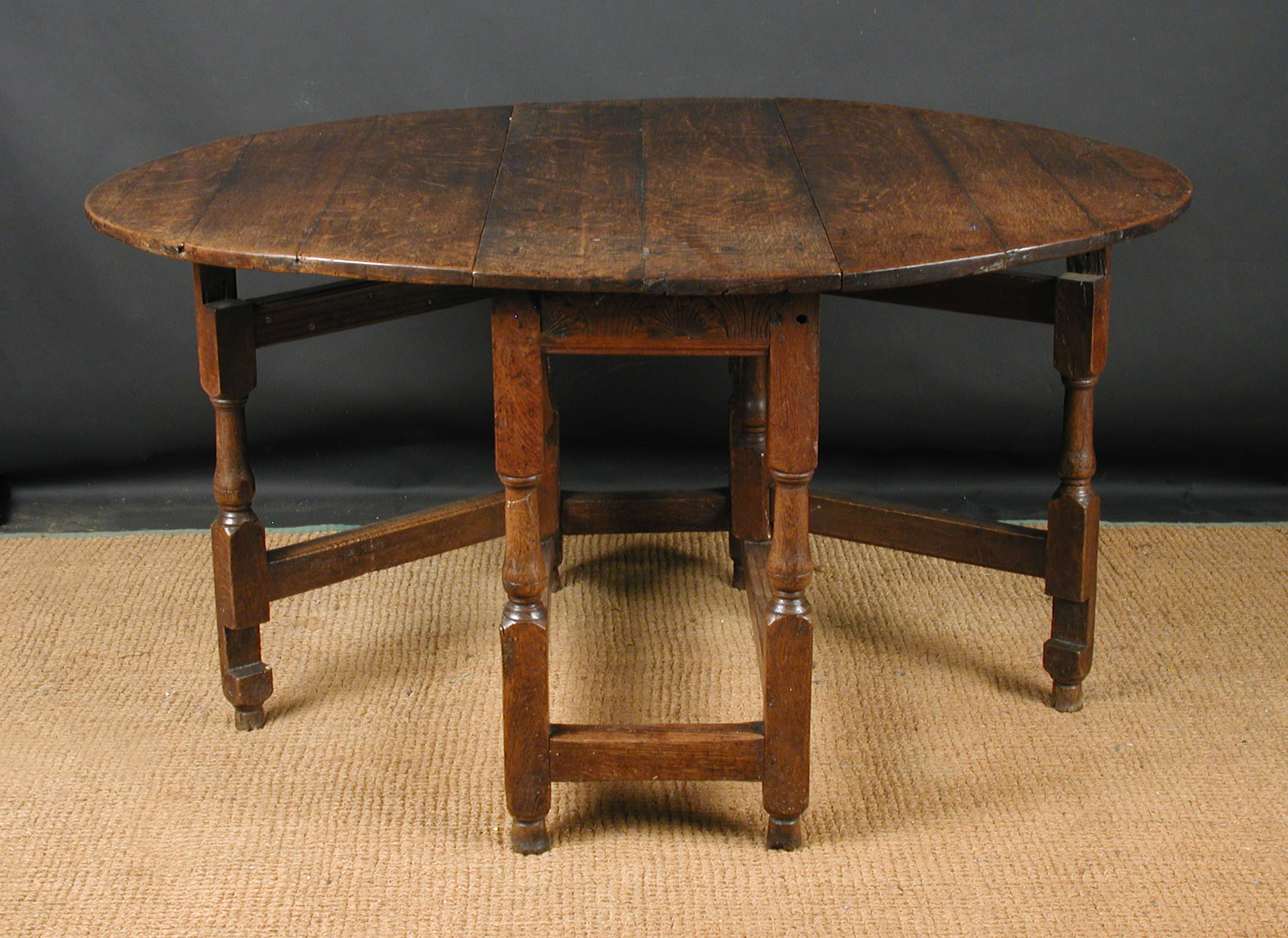 A 17th Century and later oak gateleg table - 136cm oval open A 17th Century and later oak gateleg