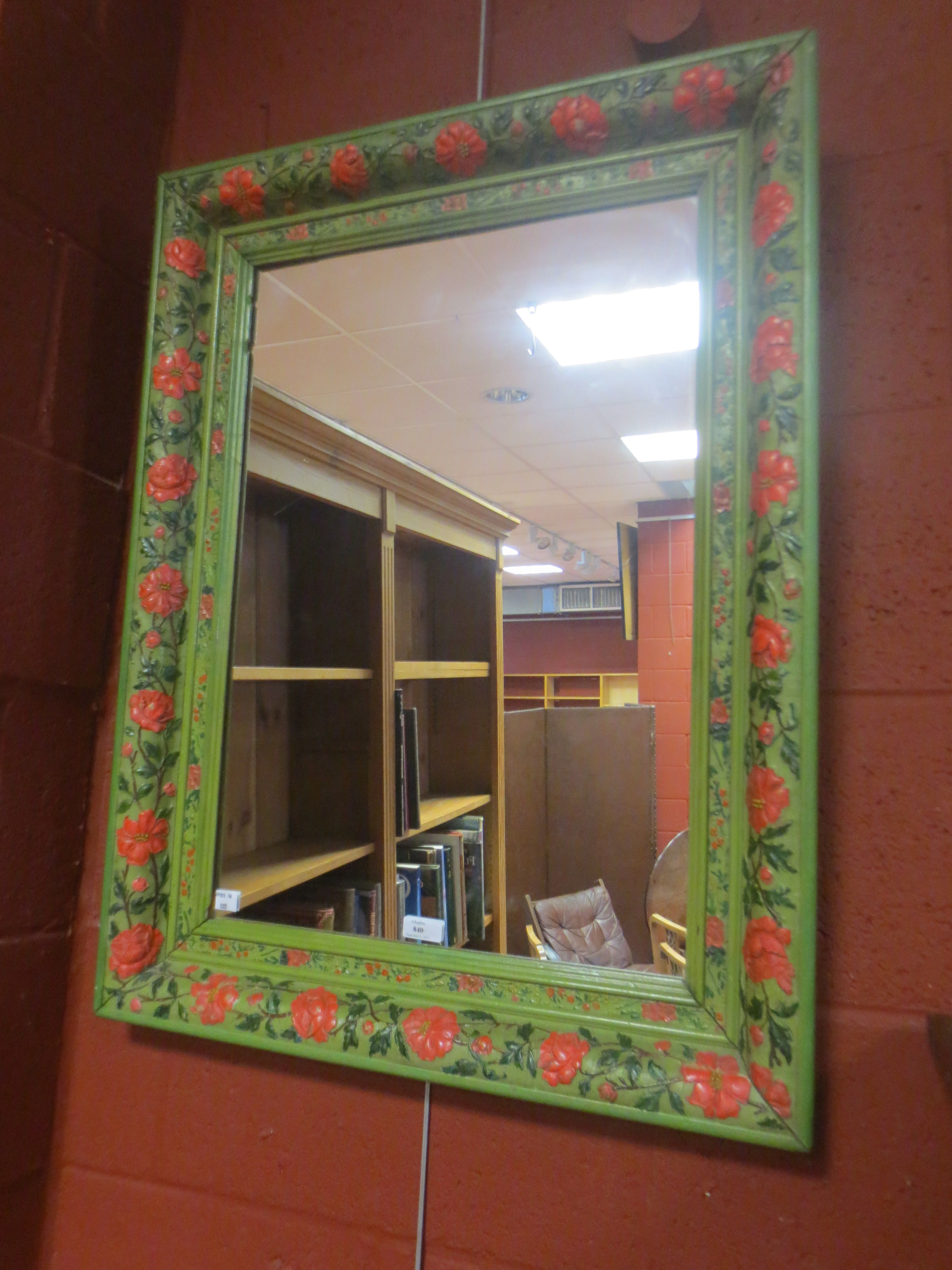A painted frame mirror A painted frame mirror