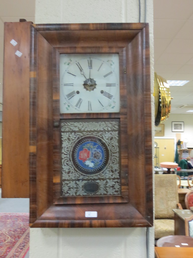 An American mahogany cased wall clock by Jerome & Co.