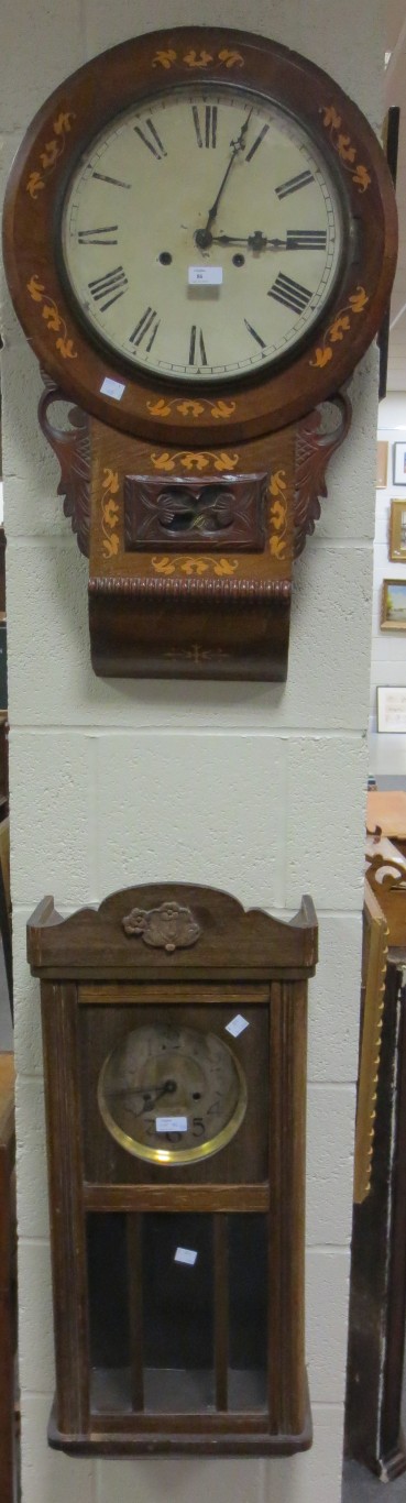 A Victorian inlaid drop dial wall clock and another later wall clock (lacking pendulum)