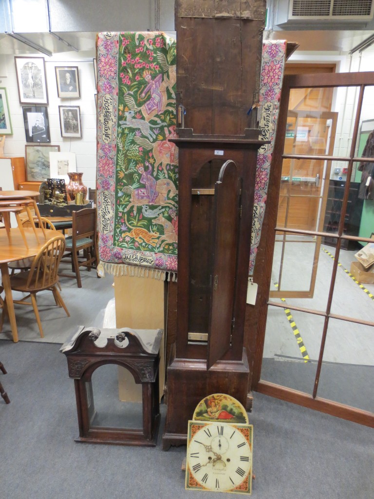 A 19th Century oak longcase clock with painted dial by Covington, Salisbury (no weights or