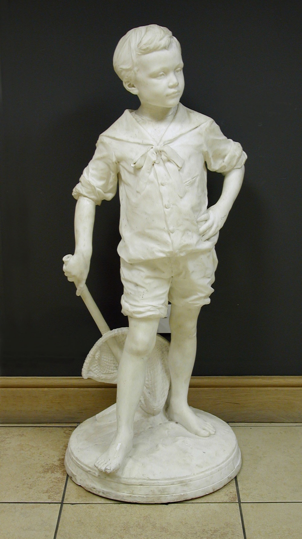 Leon-Joseph Chavalliaud, (French 1858-1921) a late 19th century marble figure of a boy, signed L