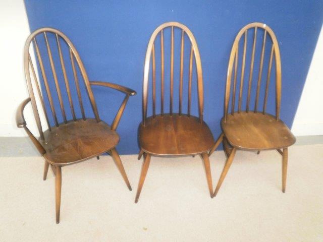 A set of six (4+2) spindle backed Ercol dining chairs.