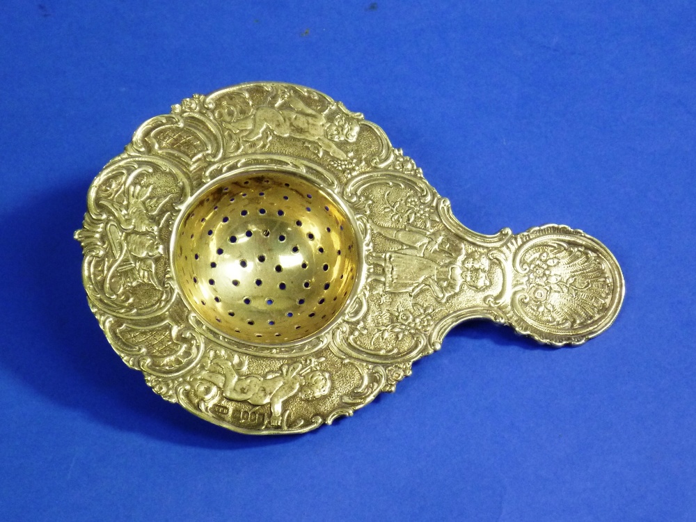 An Edwardian period ornate continental silver Strainer, by Edwin Thompson Bryant, import marks for