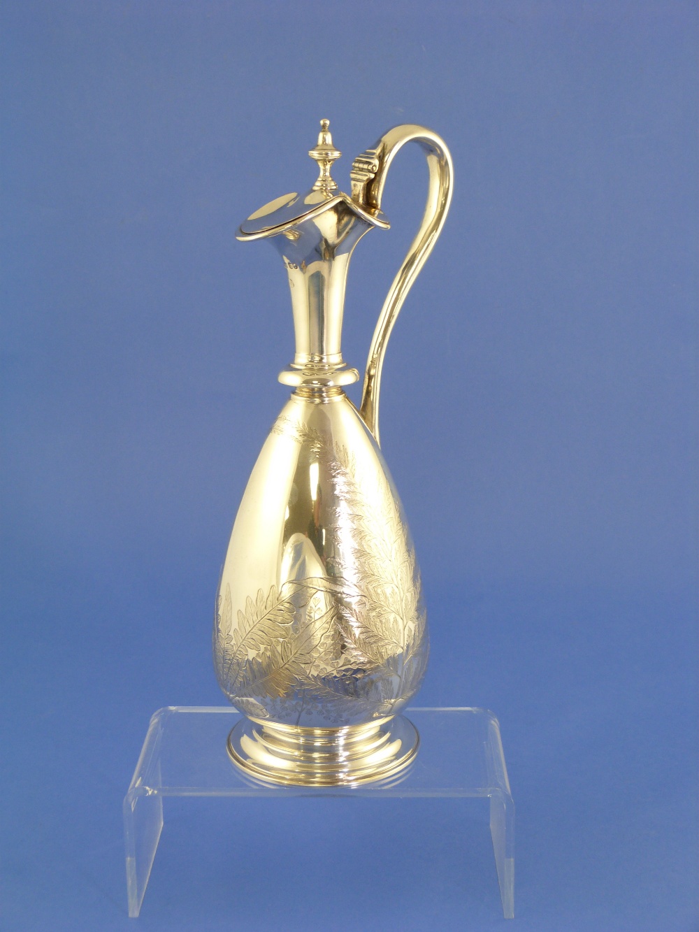 A Victorian silver Ewer, by Stephen Smith, hallmarked London, 1869, of baluster form with hinged