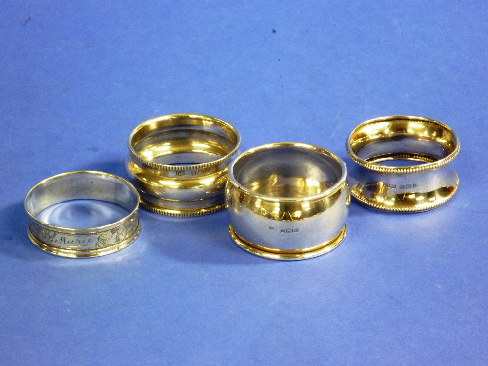 Four various silver Napkin Rings, including Victorian, Edwardian and George V examples (4)