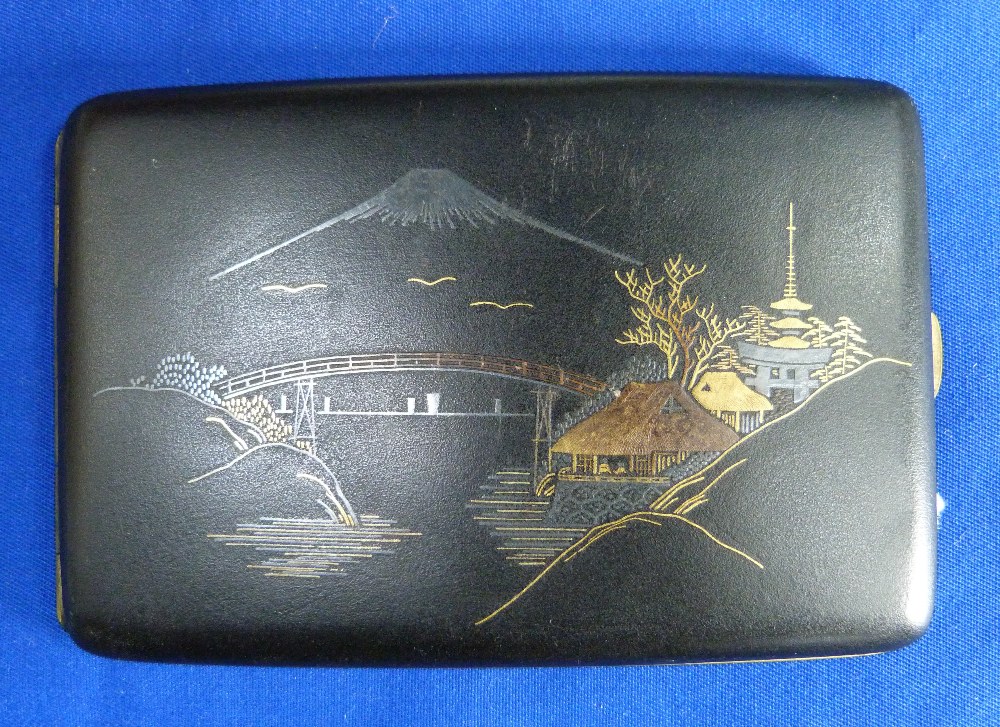 A rectangular shaped Cigarette Case; in black lacquer, the front inlaid with a scene of Mount Fuji