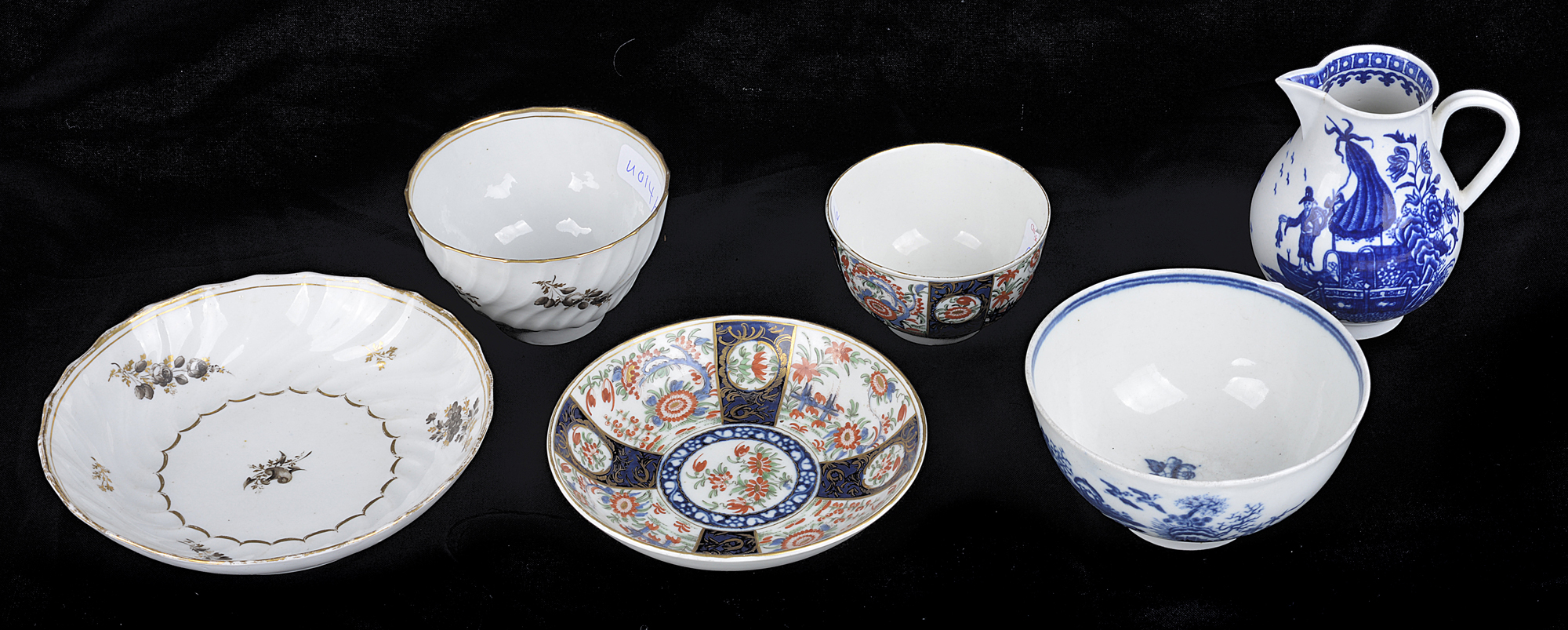 A Worcester jug, a Caughley bowl, a good Worcester polychrome tea bowl and saucer and another