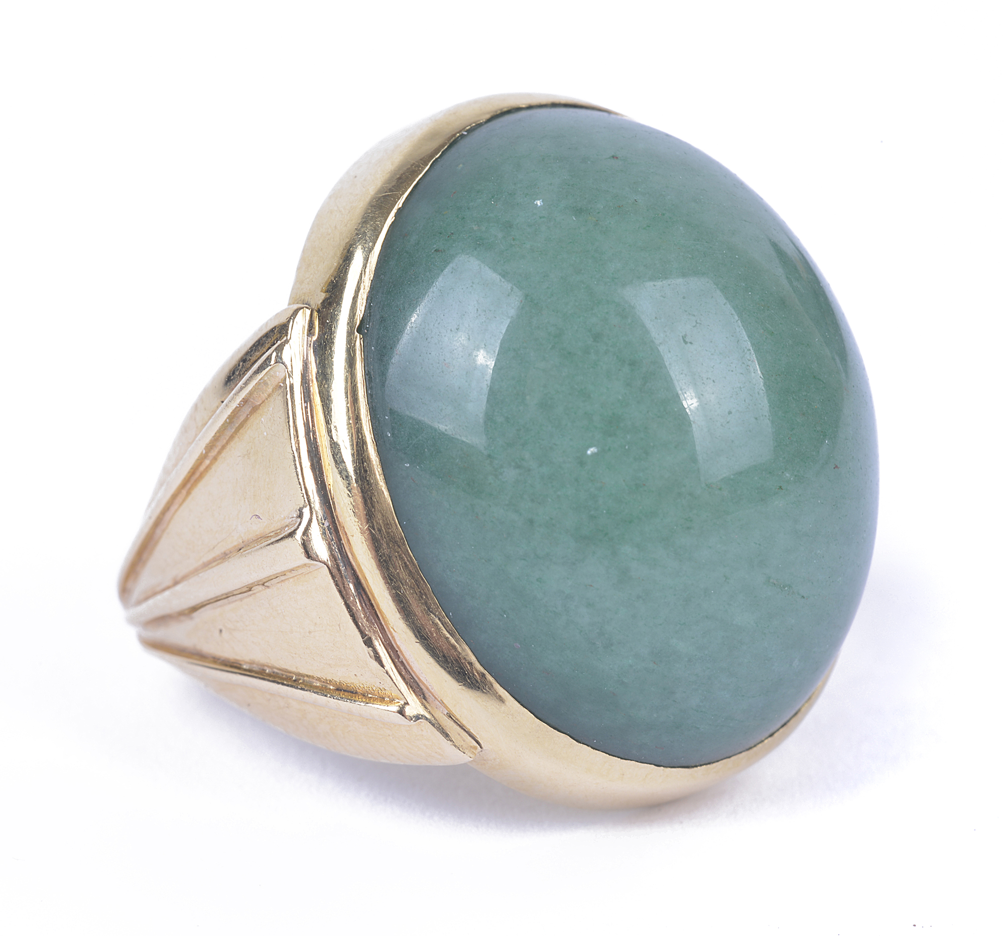 A French 18 carat yellow gold ring centred with a large cabouchon cut aventurine quartz, the