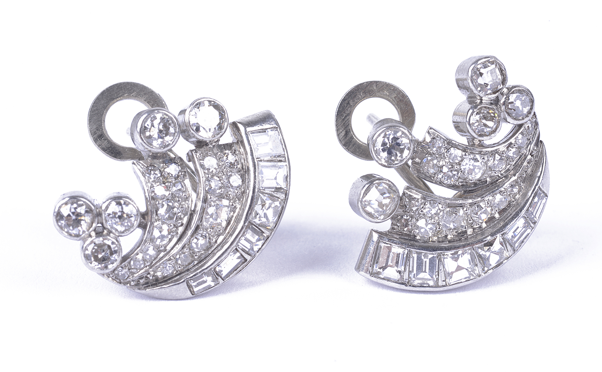 A pair of platinum ear clips set with baguette and round old cut diamonds, marked `Ste S.G.O.`,