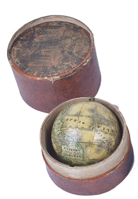 A 19th Century German pocket globe, inscribed `The Earth, published by J.G. Klinger, Nuremberg`,