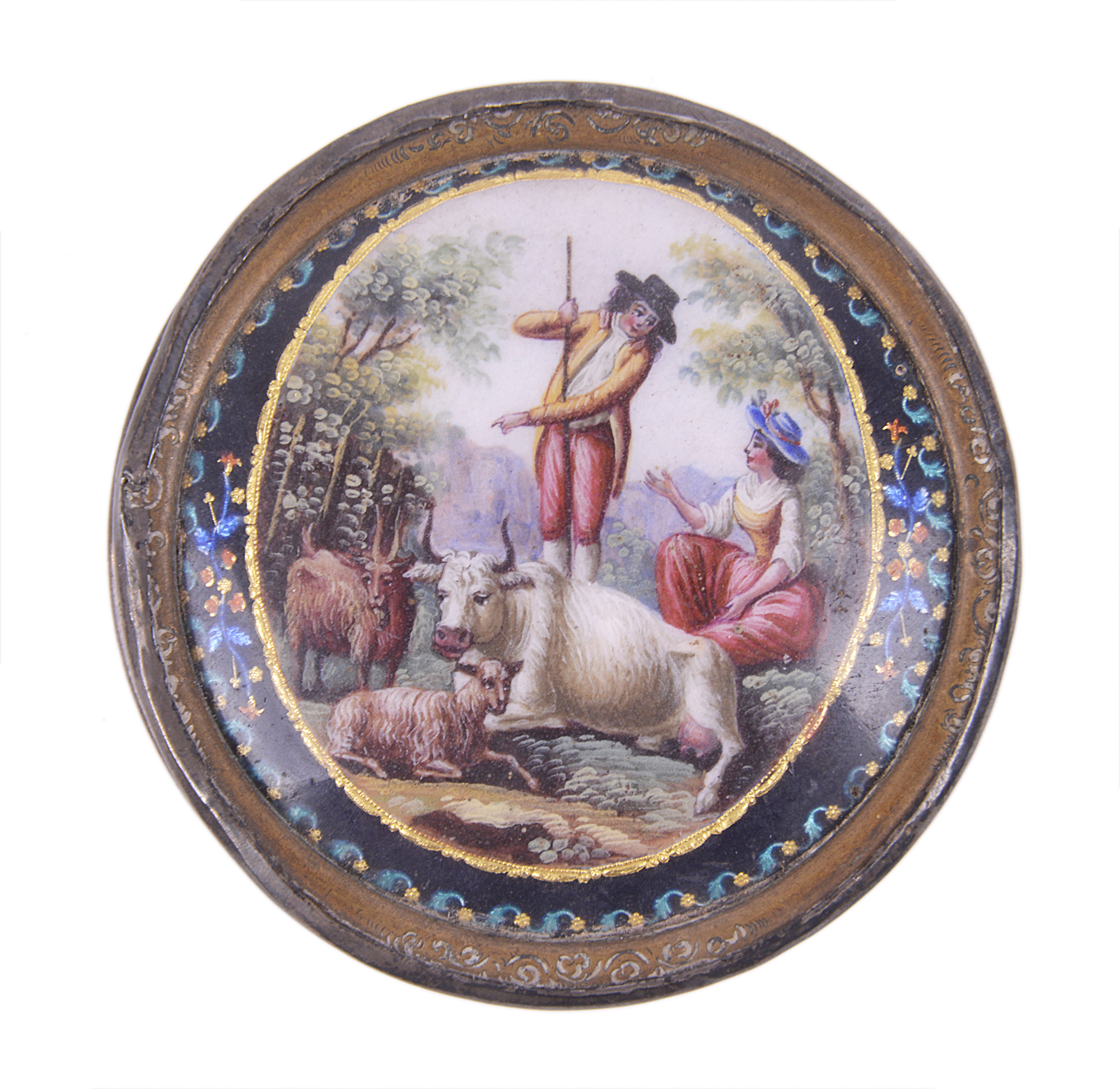 An enamelled French 18th Century circular box showing a shepherd.