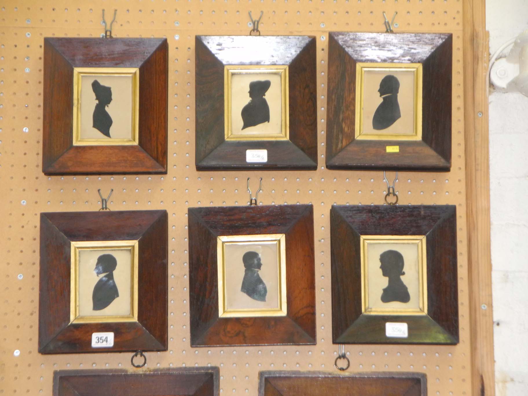A matched set of six Victorian rosewood framed silhouette heads. (6)