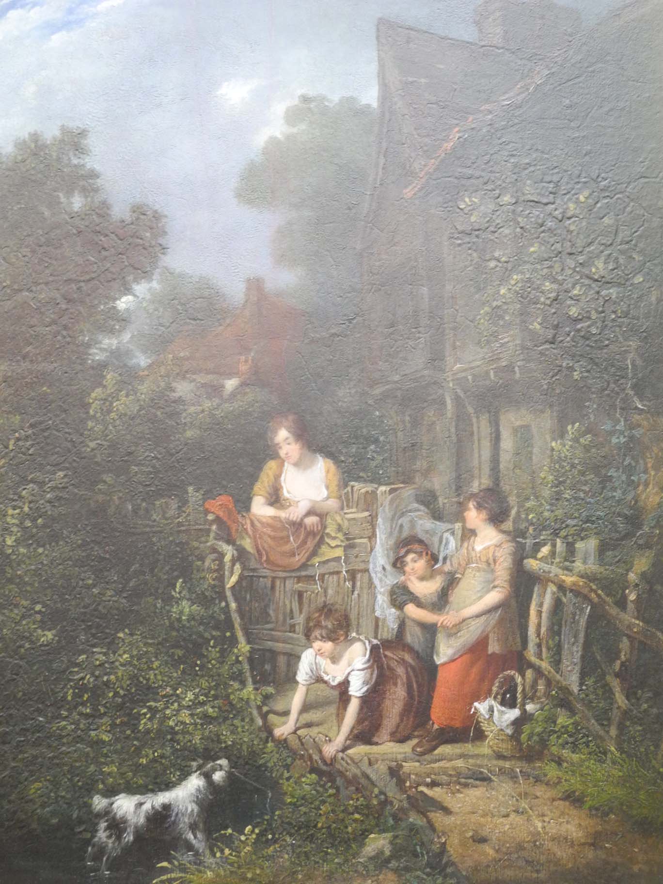 W.F. Witherington (1785-1865), an oil of a family at leisure outside their cottage in a good gilt