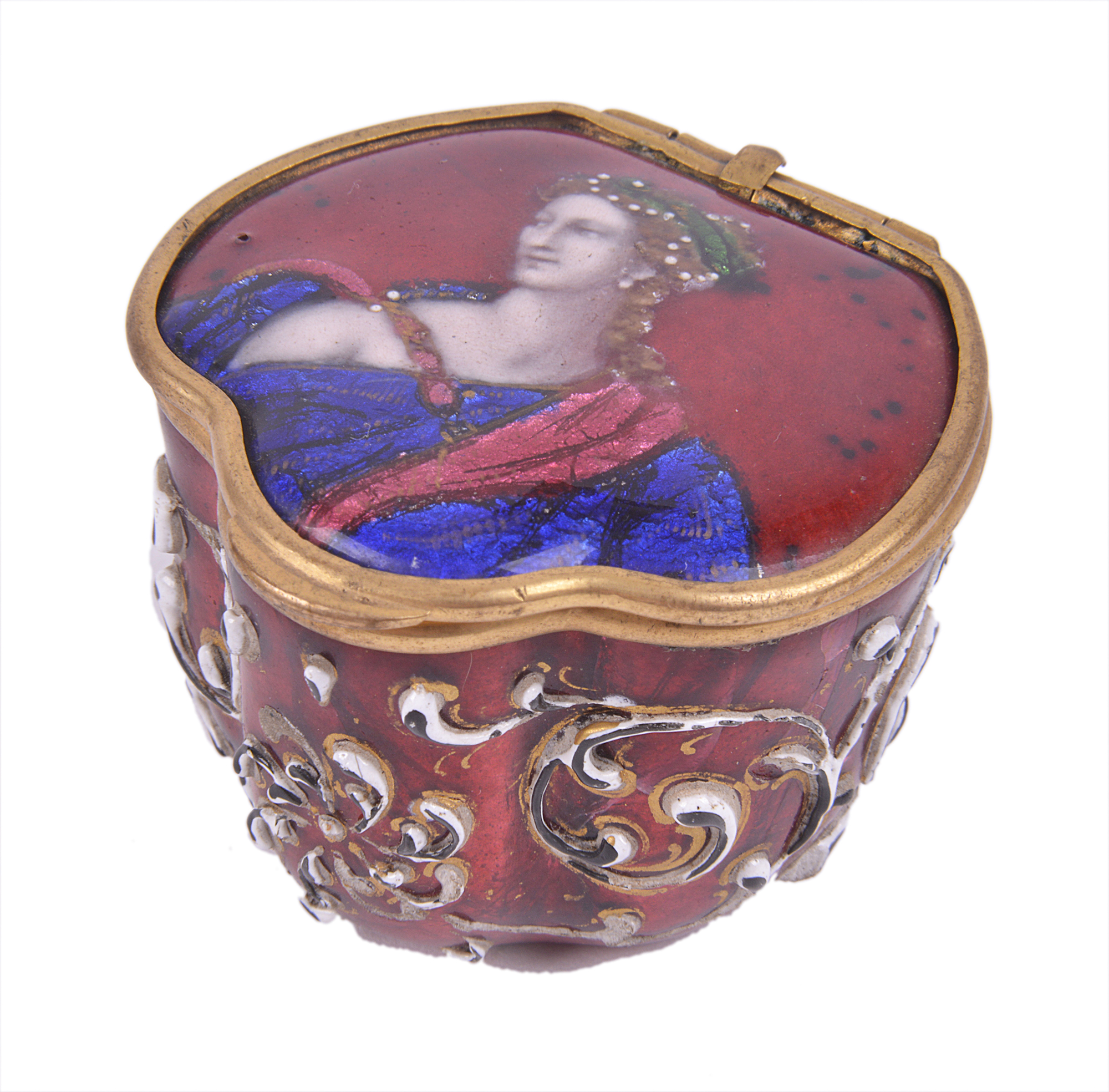 A plique à jour red enamelled box showing a queen in blue robe.