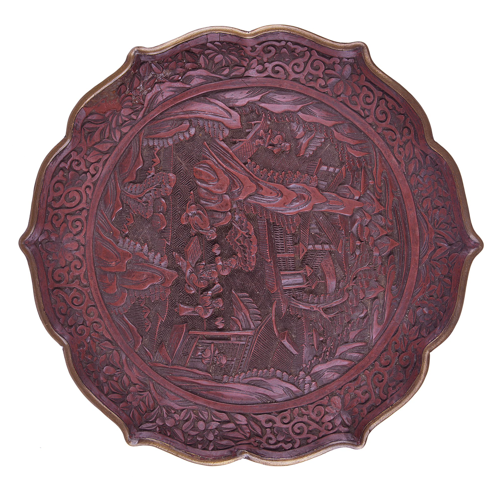 An antique, possibly 18th Century Chinese export brown glazed cinnabar lacquered dish on copper,