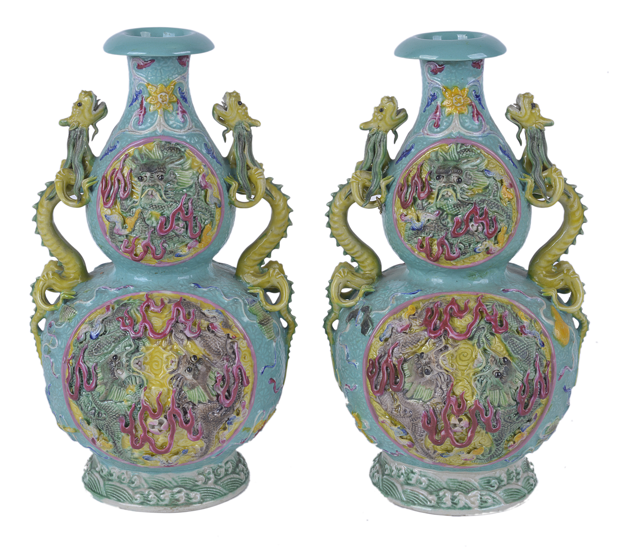 A pair of 19th Century Chinese porcelain vases, with turquoise ground and dragon handles, with