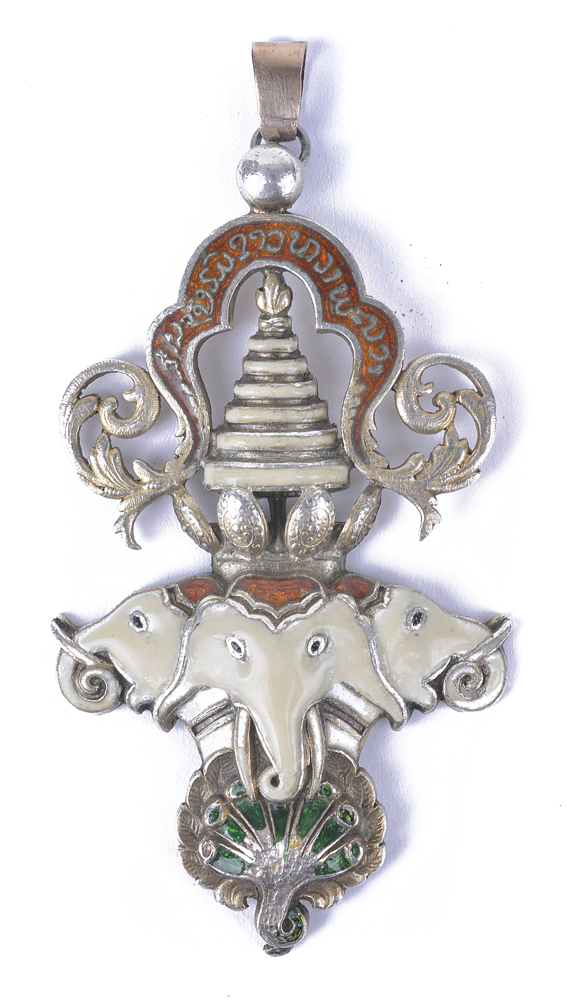 An enamel and plated metal medal from Laos, with Airavata, a mythological three-headed white