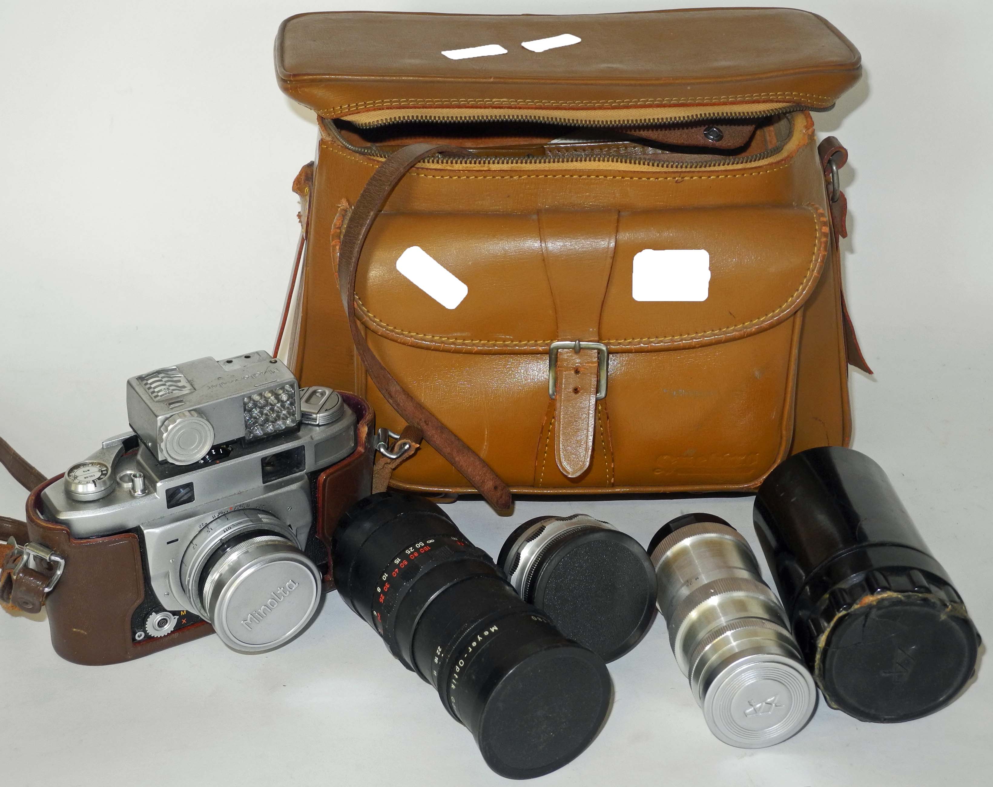 A post-War Leica camera, Serial No. 214029, Model 111A, sold with leather carrying case, also