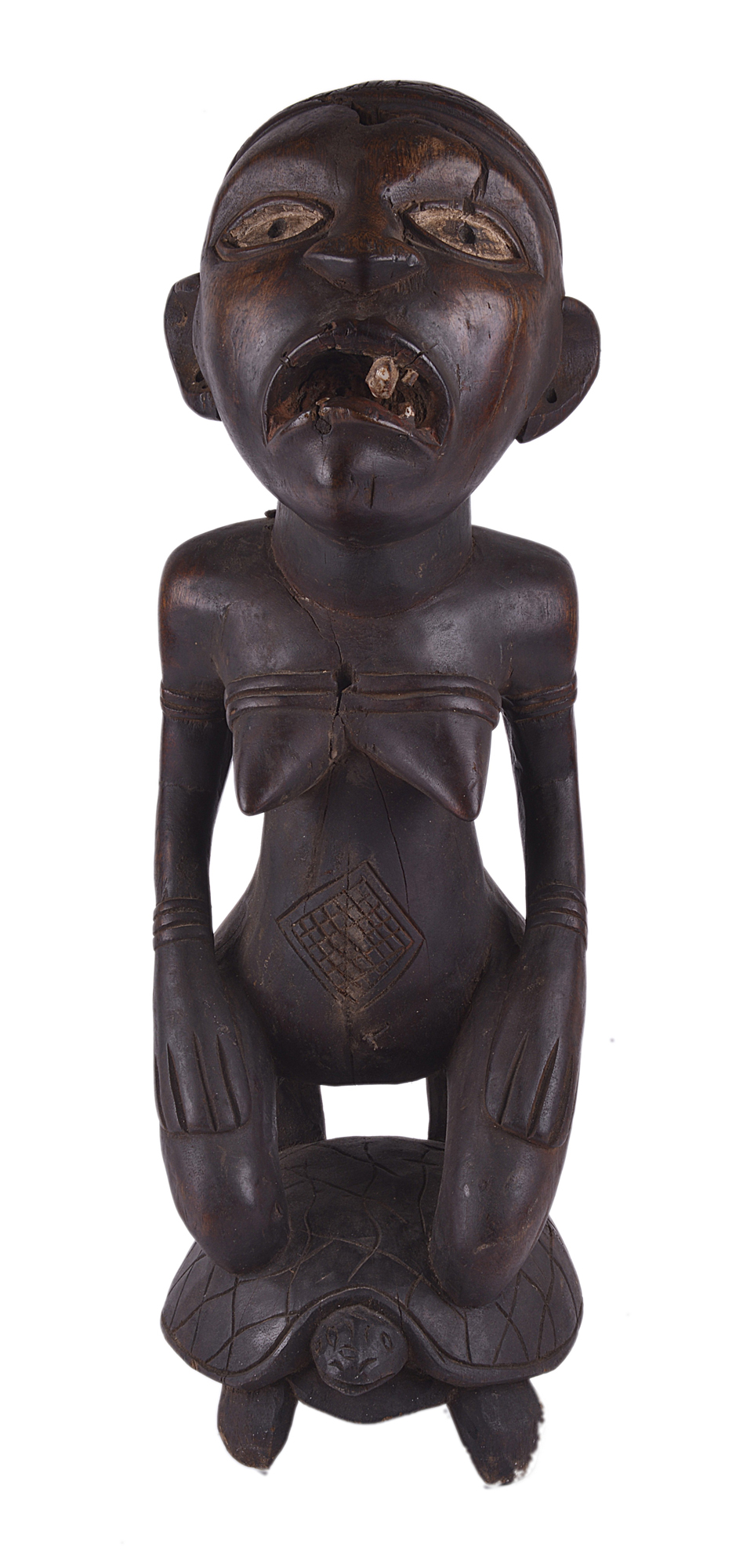 Yombe tribe (South of Congo), a carved fertility symbol, with painted eyes and applied teeth, riding