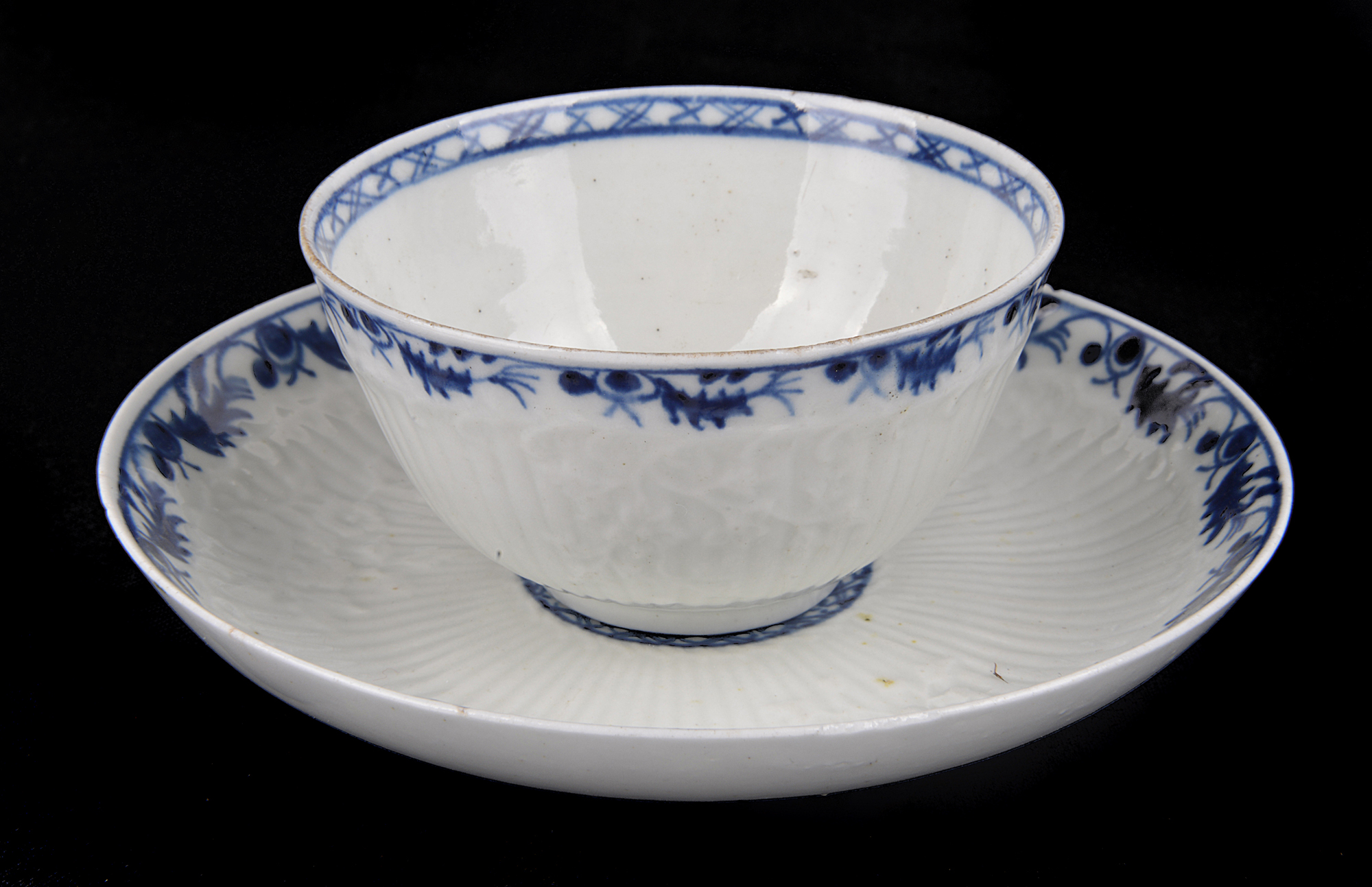 A Liverpool, Seth Pennington/John Part blue and white porcelain tea bowl and saucer. (2)