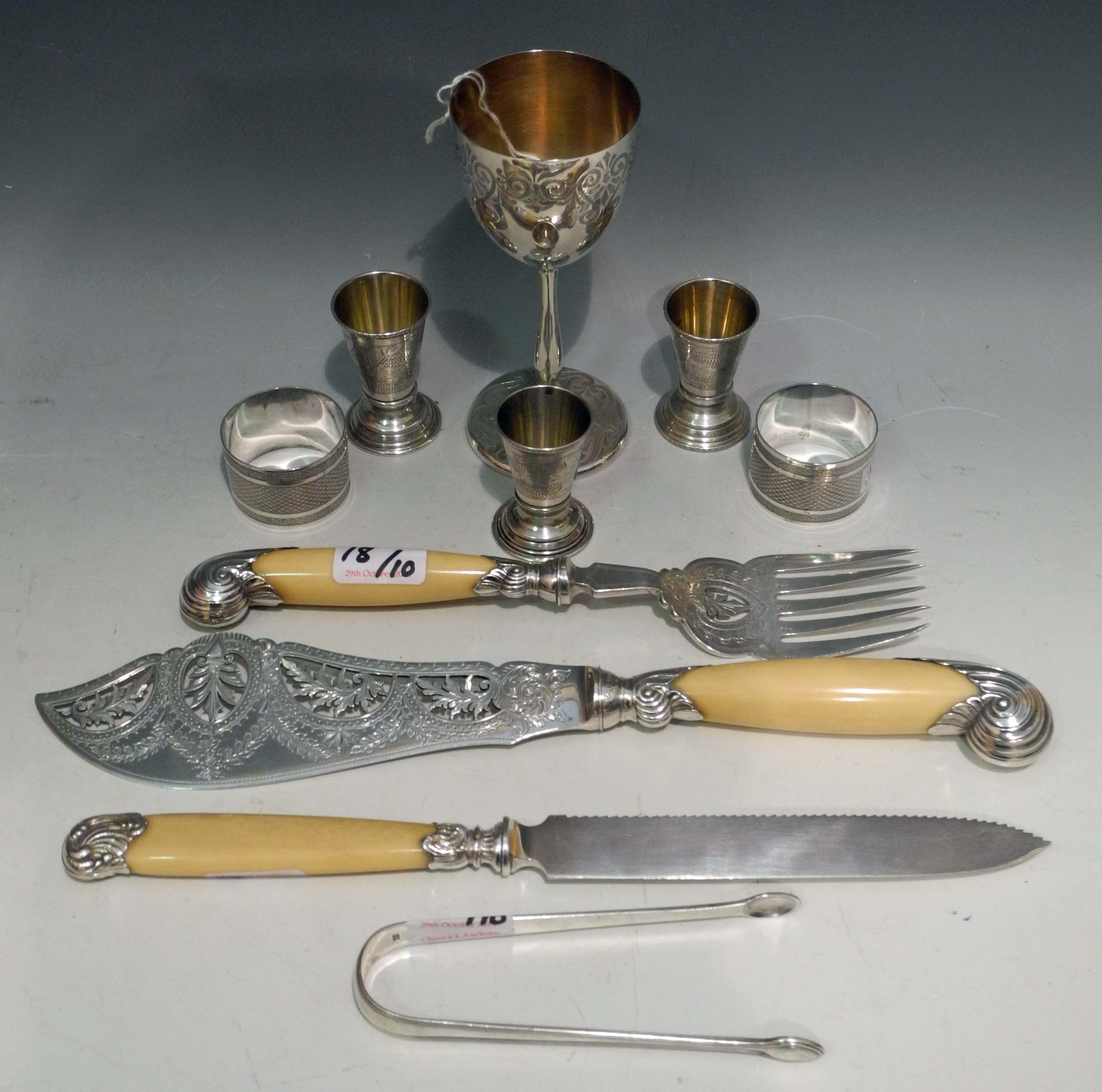 A three piece Edward VII carving set, with pierced and engraved leaf decoration, bone handle,