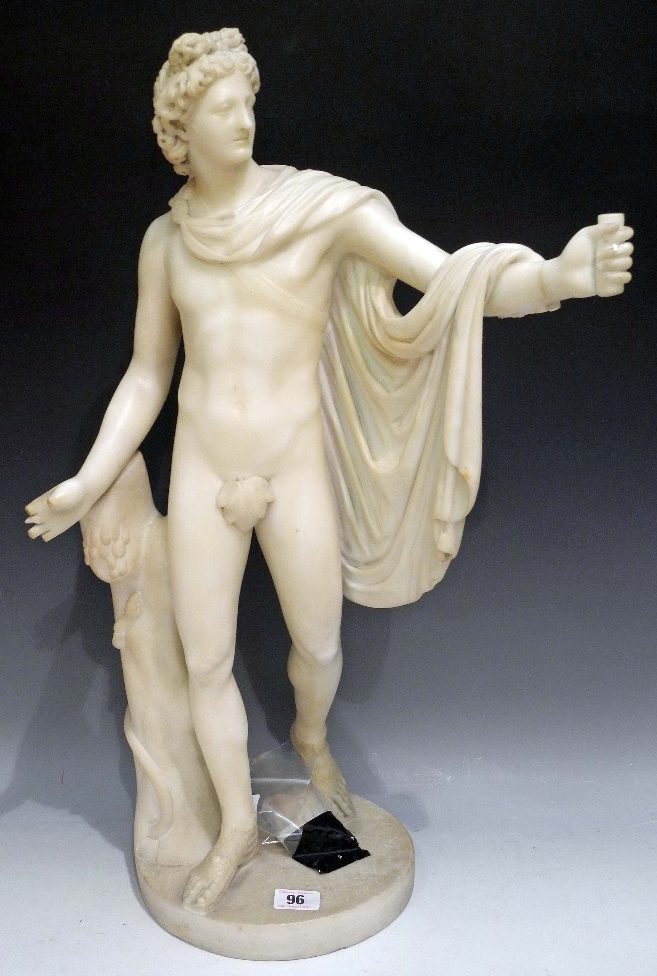 A late 19th Century marble carved figure of the Belvedere Apollo (cloak needs repair).Height 60cm