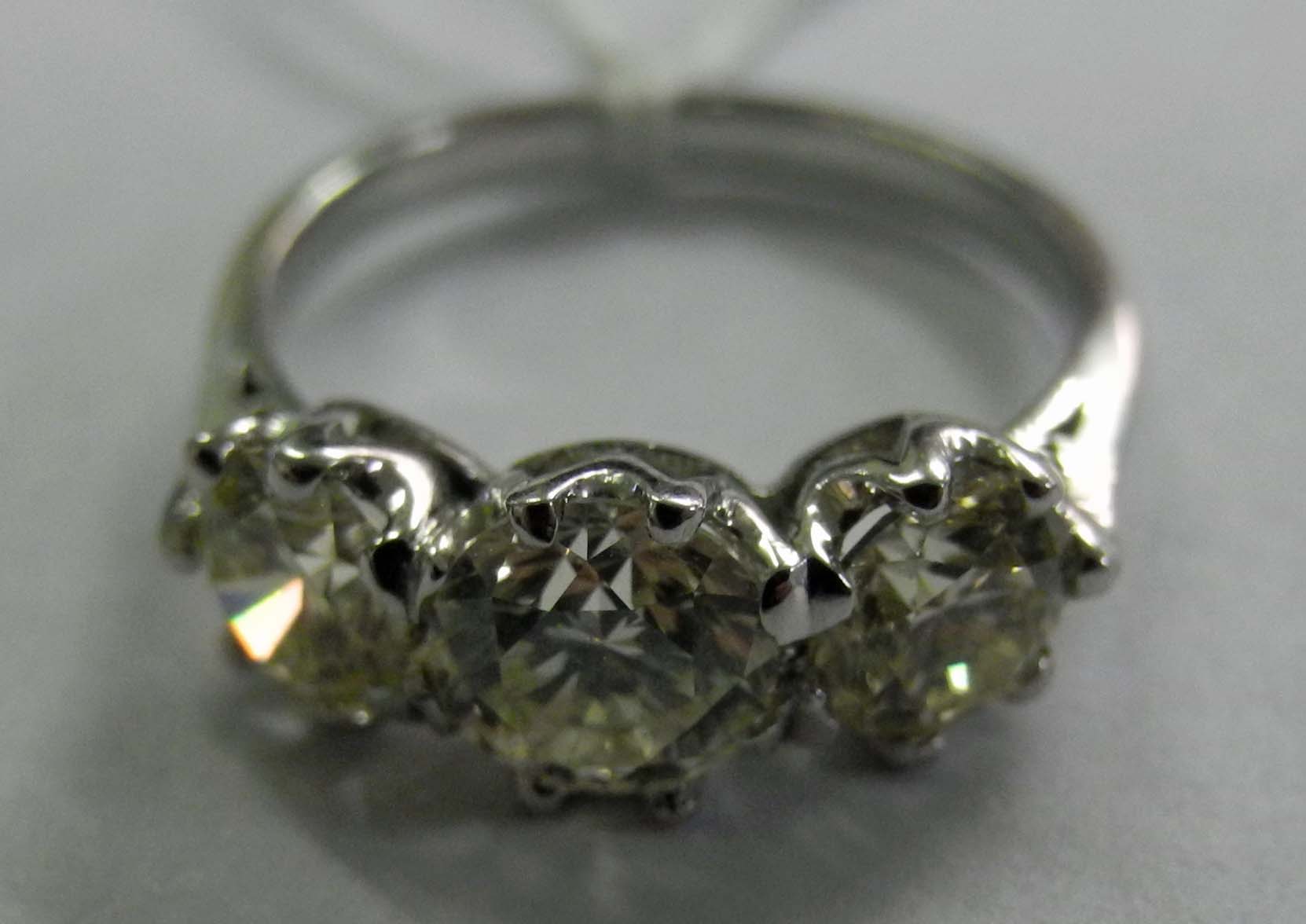 An 18ct white gold three stone 2.08 ct diamond ring