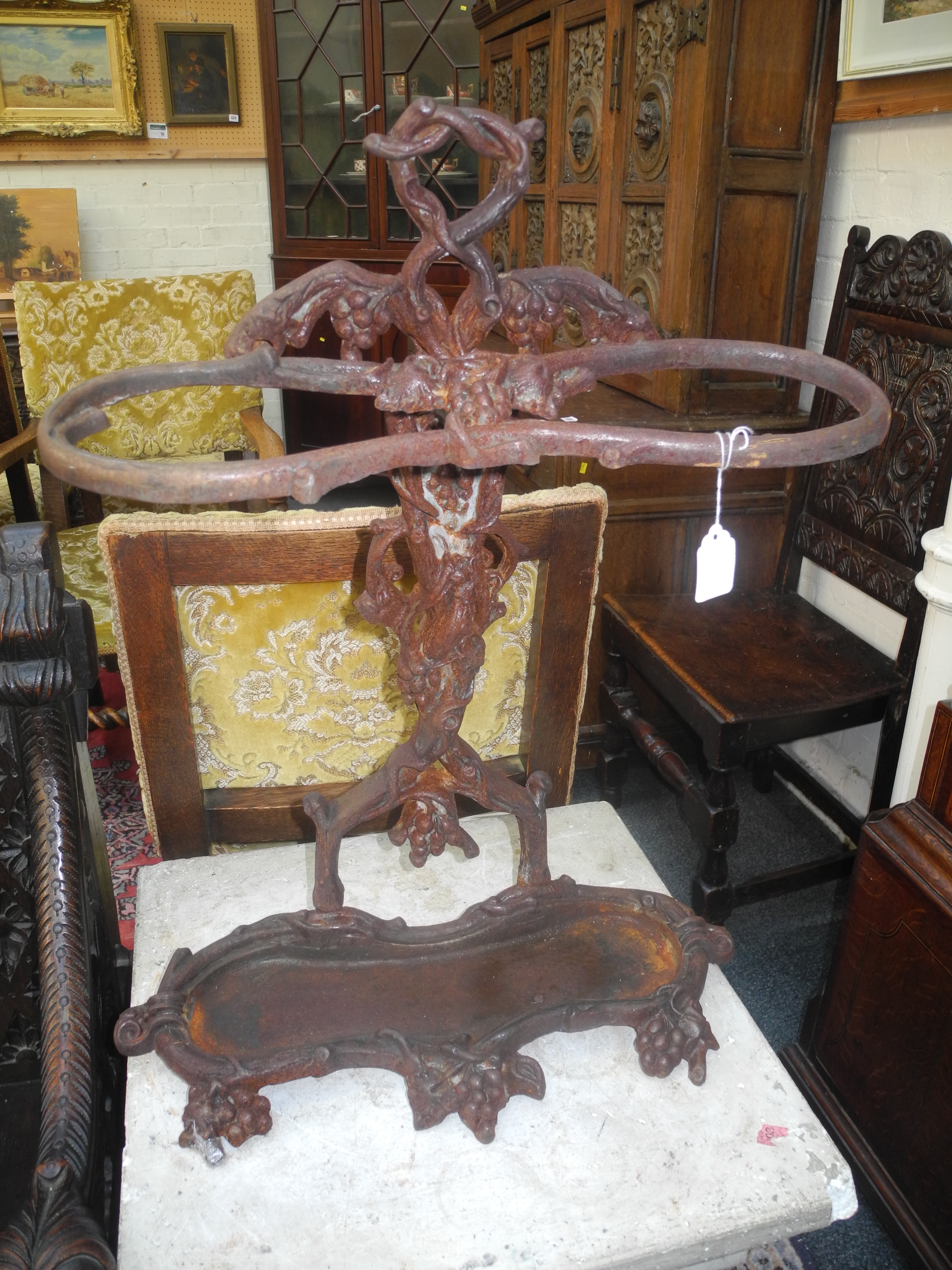 A cast iron `Fruiting Vine` stick and umbrella stand.