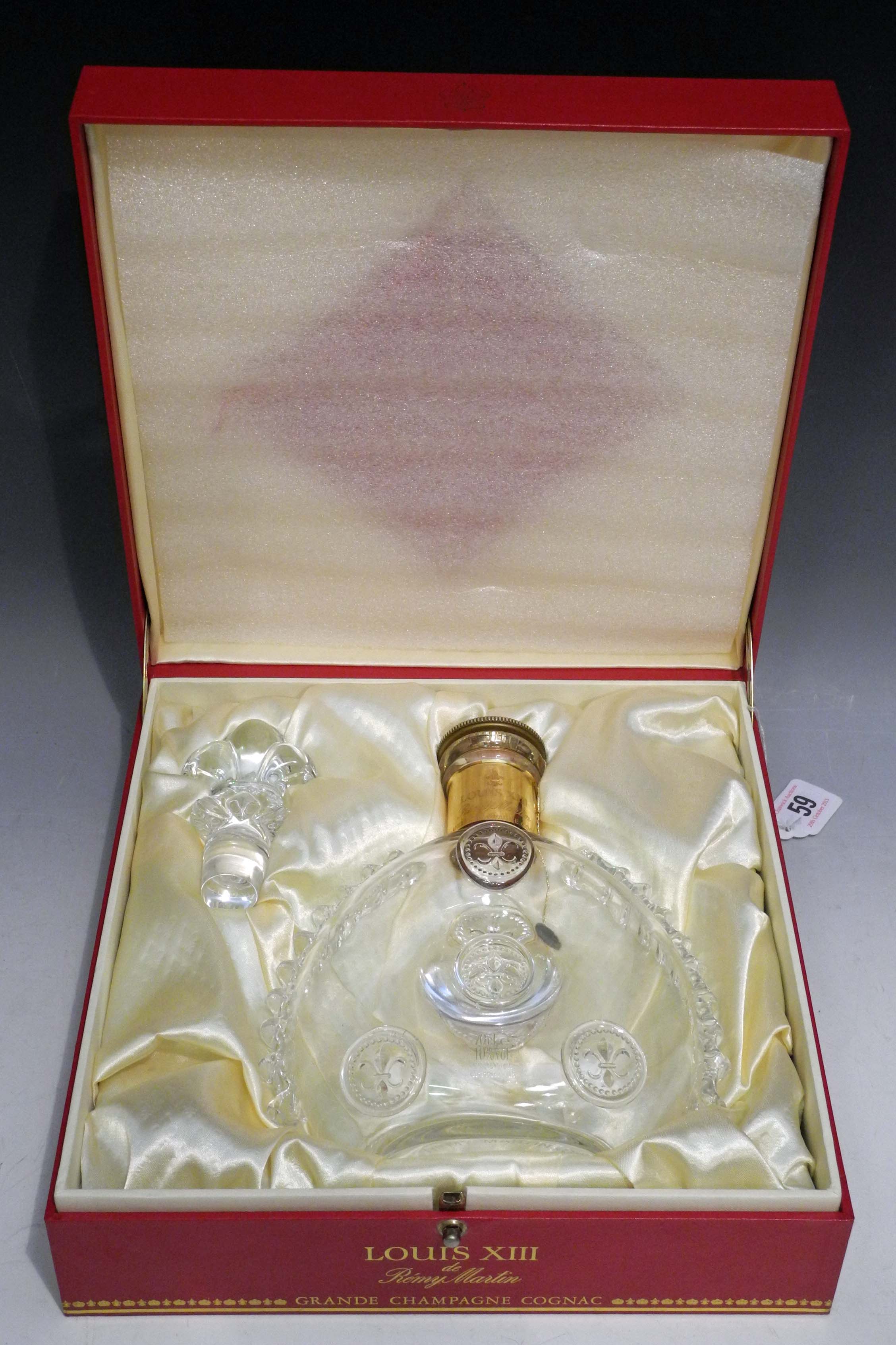 A boxed Remy Martin Louis XIII champagne cognac bottle by Baccarat Cristal, engraved to base AA