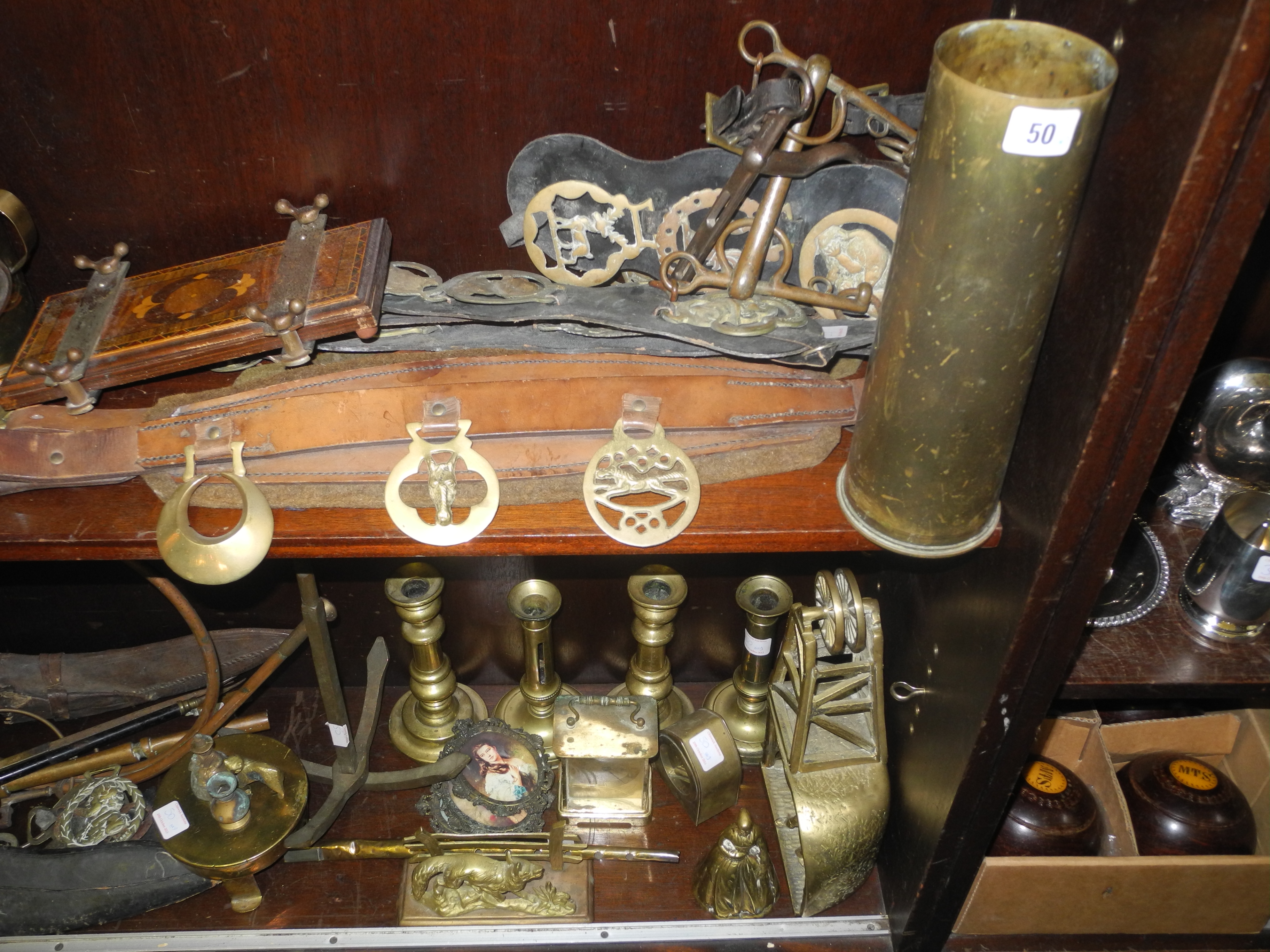 A large and miscellaneous collection of brass ware to include shell Trench Art, Pepe coffee grinder,