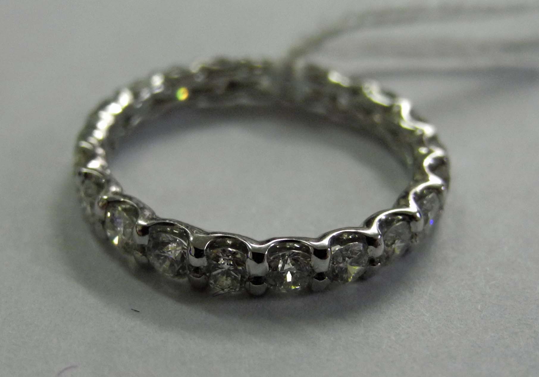 An 18ct white gold and diamond full eternity ring (1.32ct).