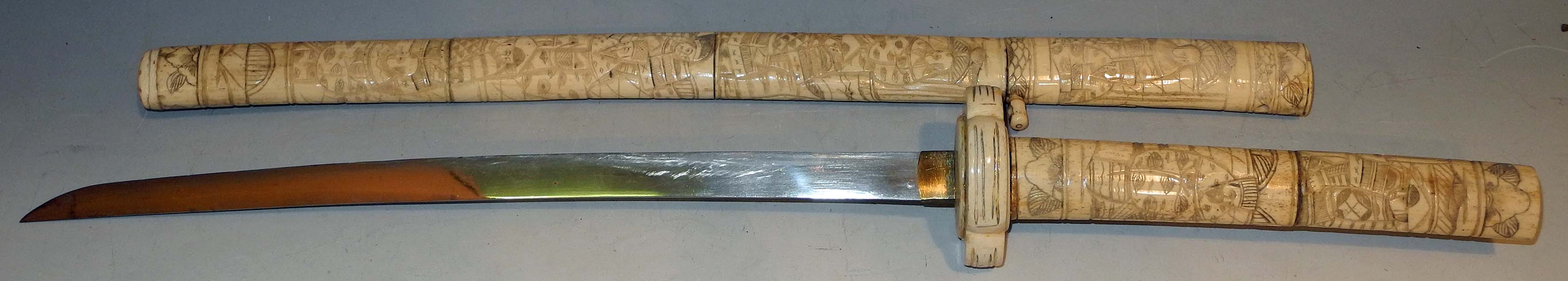 A Japanese short sword of Shin-Gunto form, part bone decorated handle and scabbard, all over