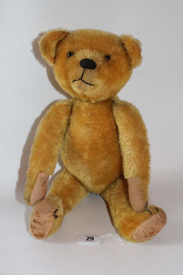 A 1950s golden mohair, Ideal, American Teddy bear, with clear glass eyes, black stitched nose, claws