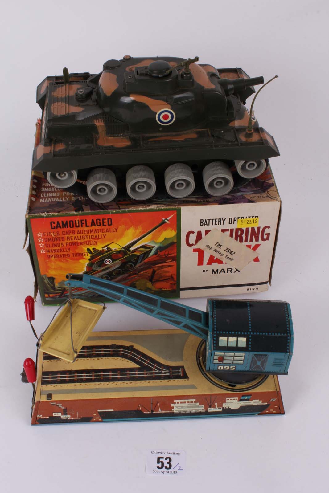 Two vintage mechanical colour tin toys, clockwork Automatic Dock-Yard Crane, with Cap Firing Tank,