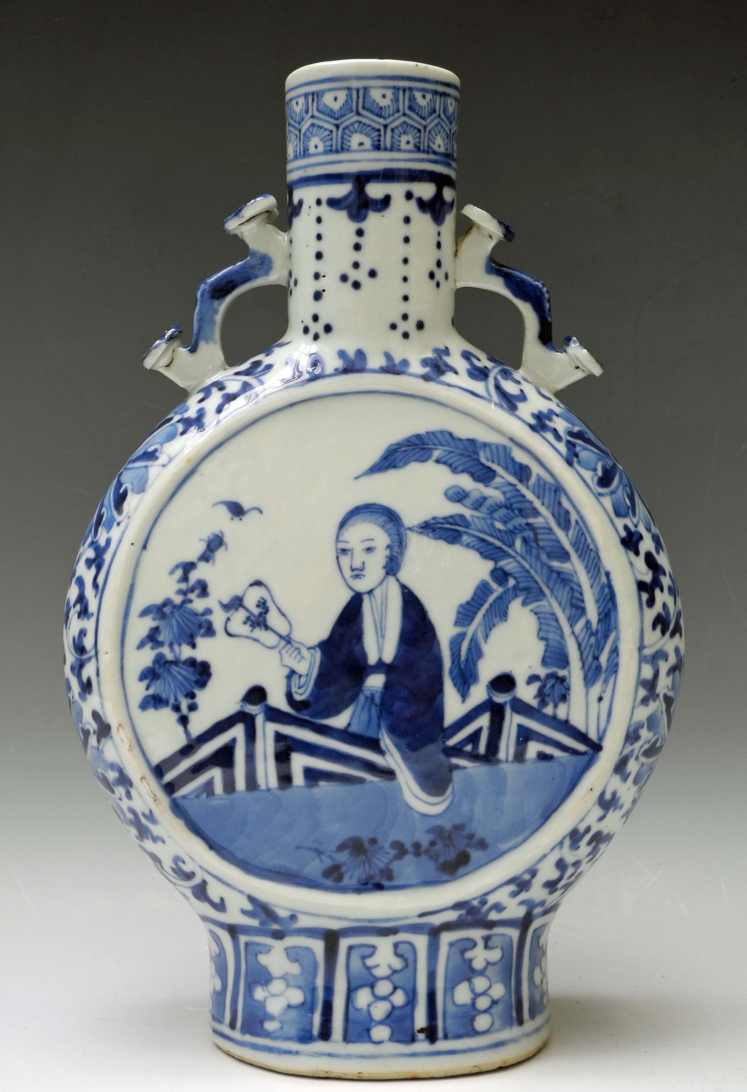A 19th Century Chinese blue and white porcelain moon vase, decorated with a lady with fan and floral