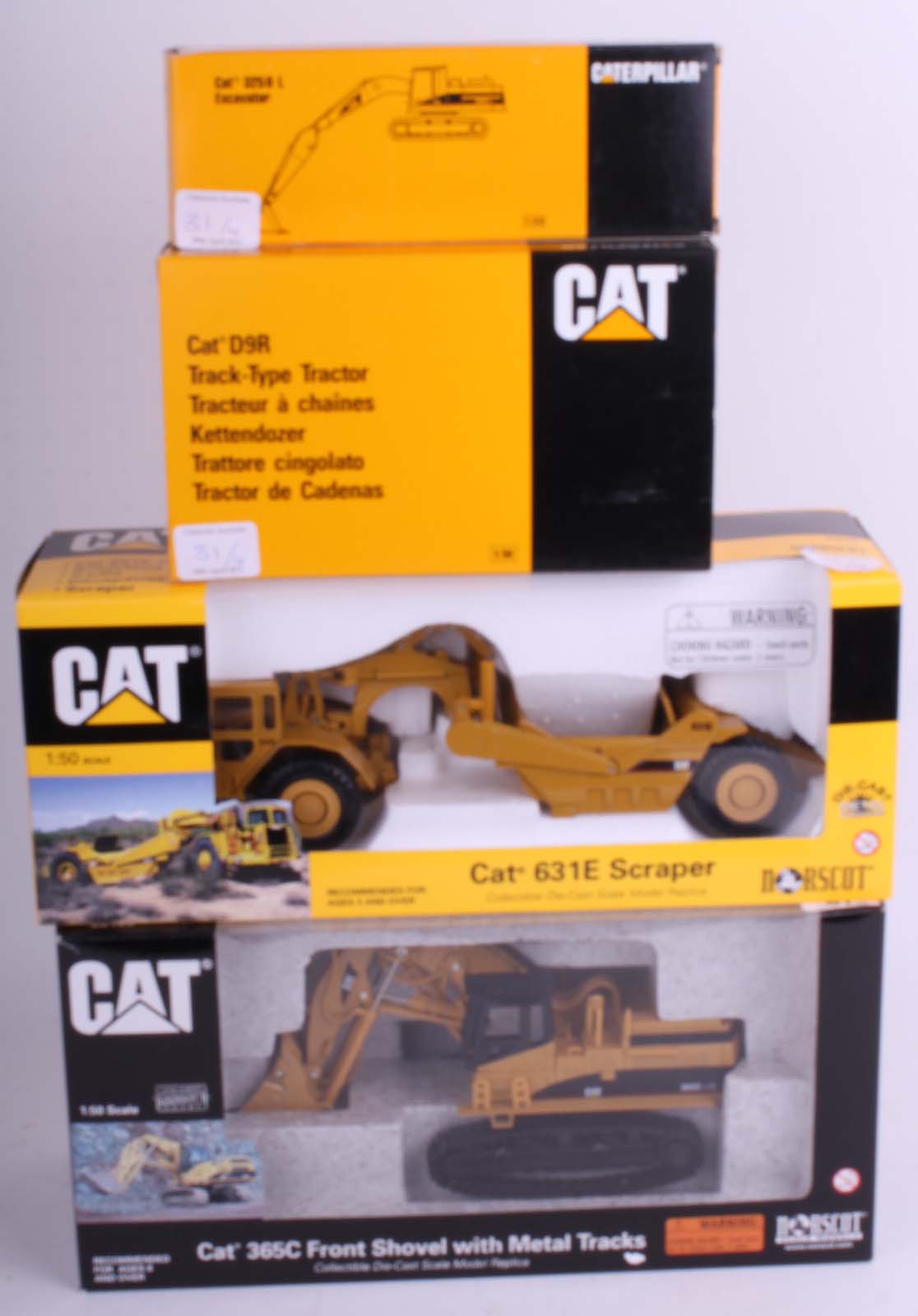 Four contemporary large scale CAT (mint in box) plant machinery including: 365C Front Shovel, 631E