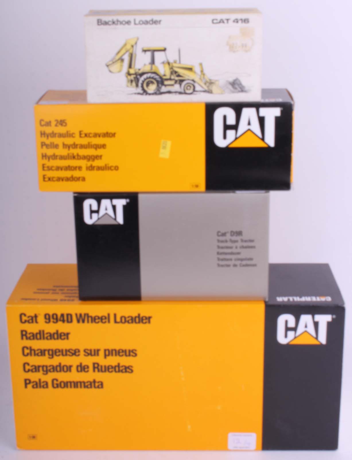 Four contemporary large scale CAT (mint in box) plant machinery including Limited Edition