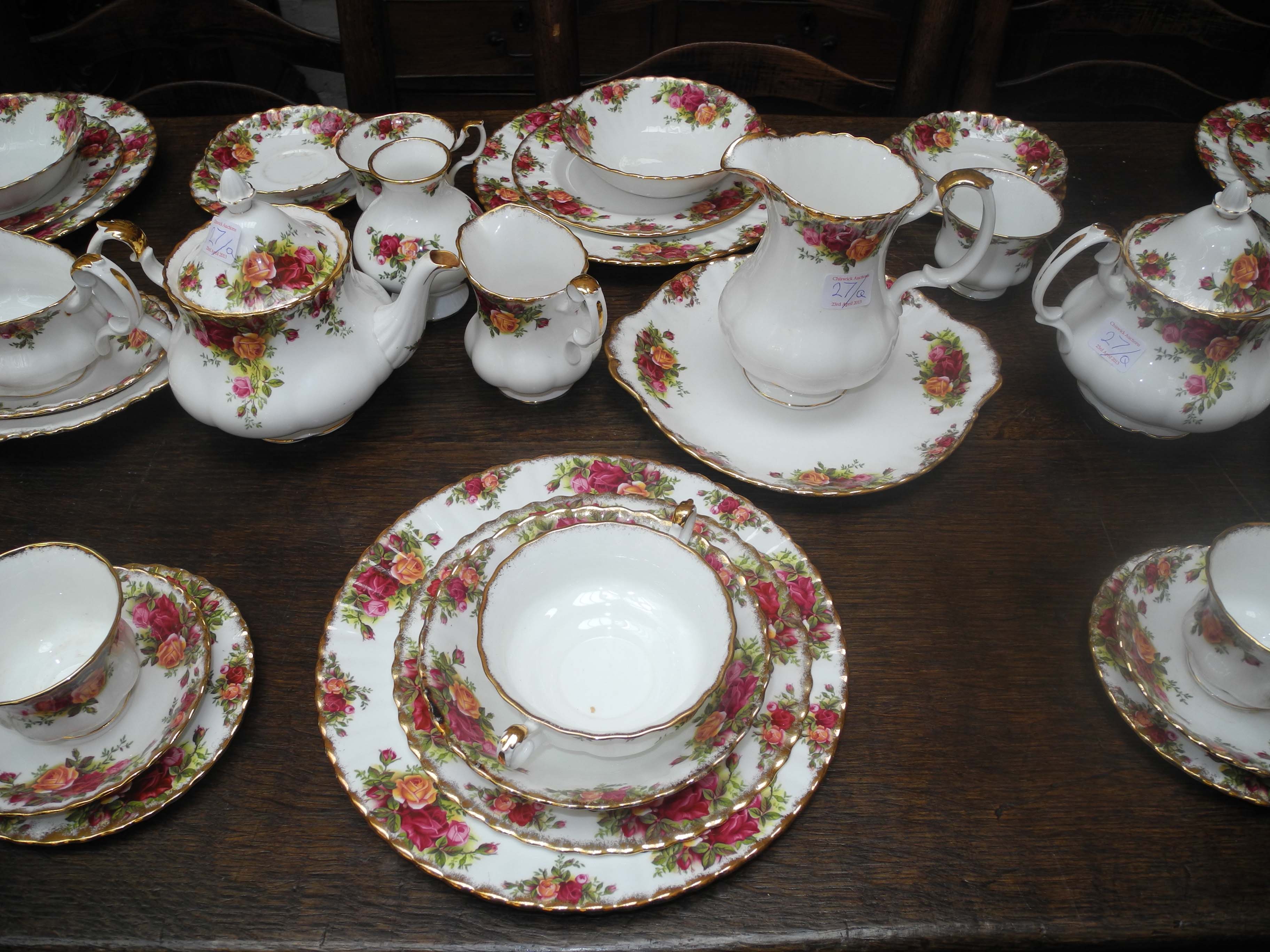 A large quantity of Royal Albert `Old Country Rose` porcelain dinner and tea wares, including two