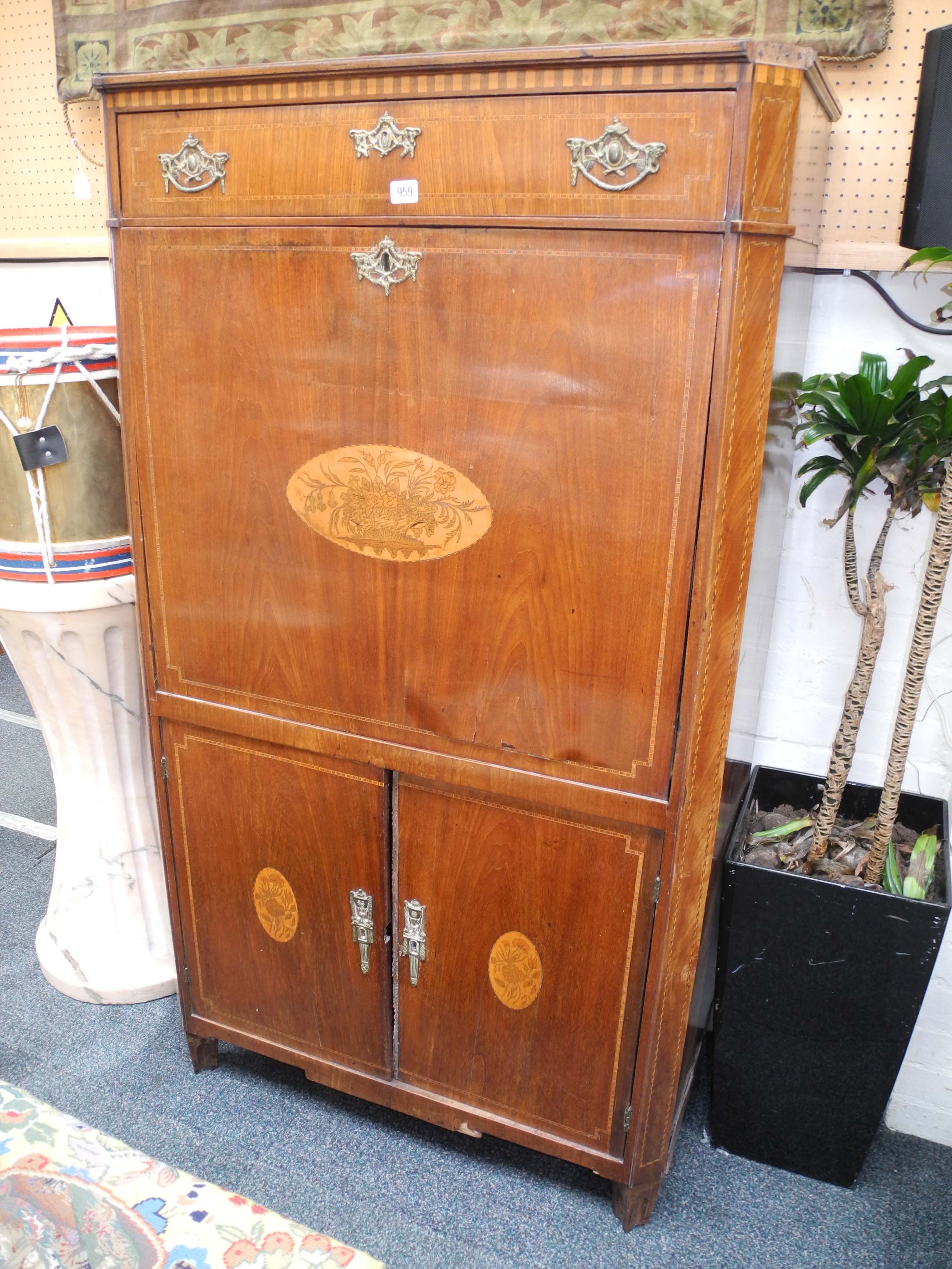 A 19th Century walnut and marquetry inlaid secretaire abbatant, with single frieze drawer over a