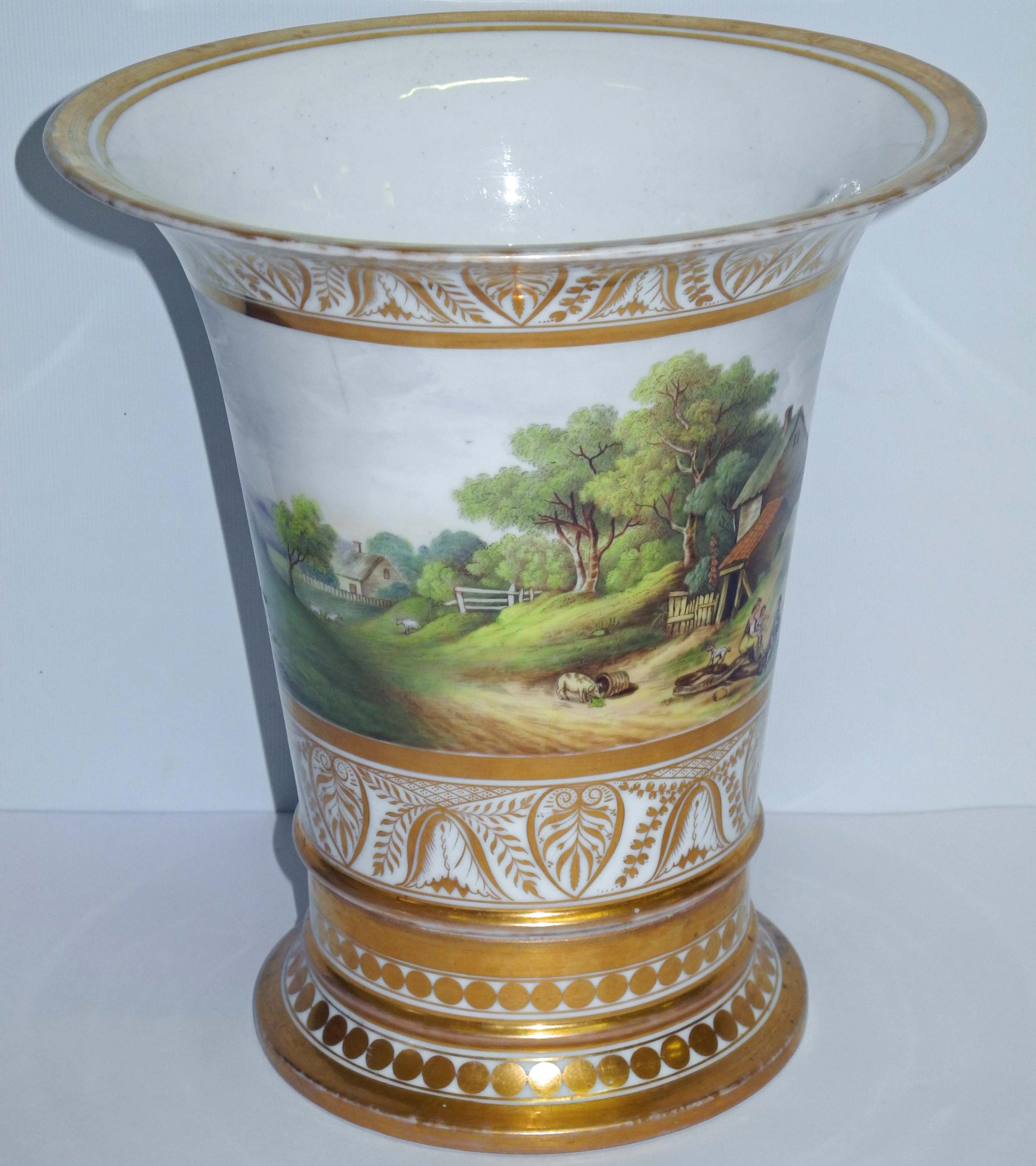 An early English porcelain tapered jardinière and stand, possibly Coalport, the hand painted